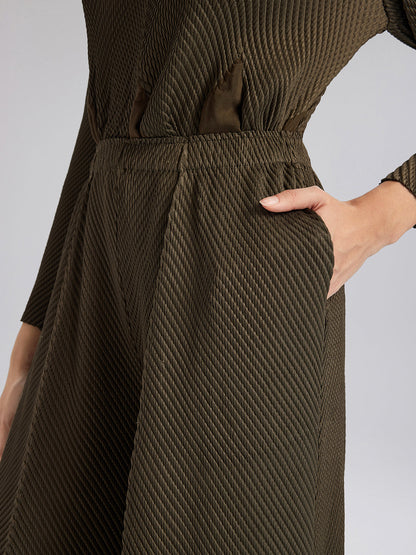 Pileli Dokulu Beli Lastikli Bol Pantolon