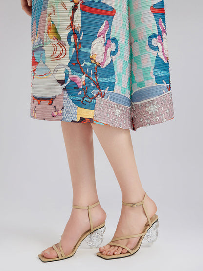 Sanatsal Desenli Pileli Dik Yaka Elbise